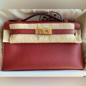 Hermes authentic Kelly pochette clutch bag rouge red swift gold hardware new